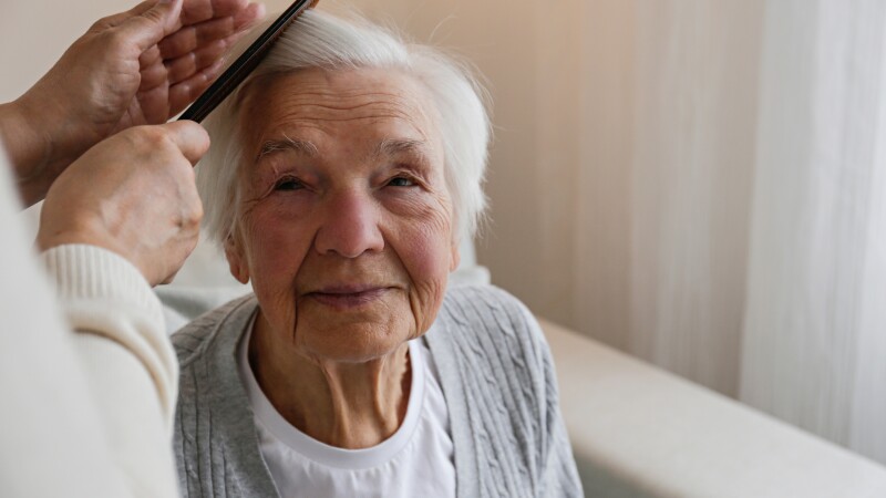 Senior, couple and drinking coffee with a love, marriage and happiness morning mindset at home. Happy smile and hug of a elderly woman and man with tea in a house kitchen together with quality time