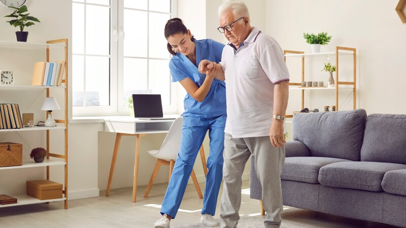 Senior, couple and drinking coffee with a love, marriage and happiness morning mindset at home. Happy smile and hug of a elderly woman and man with tea in a house kitchen together with quality time